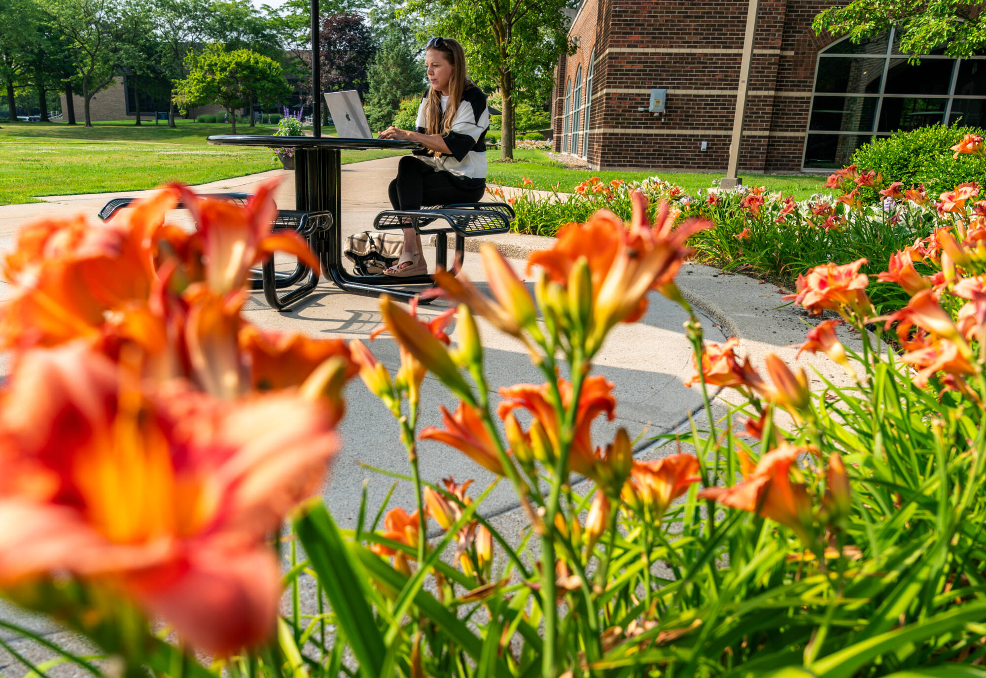 Anne Brinich sits outside the Kirkhof Center on July 9.